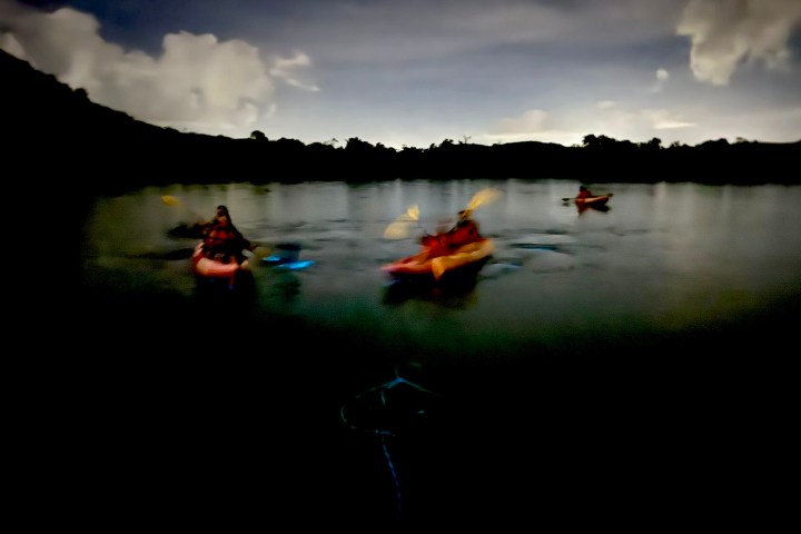 a small boat in a body of water